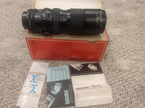 Sigma high power zoom lens - sigma-xq,